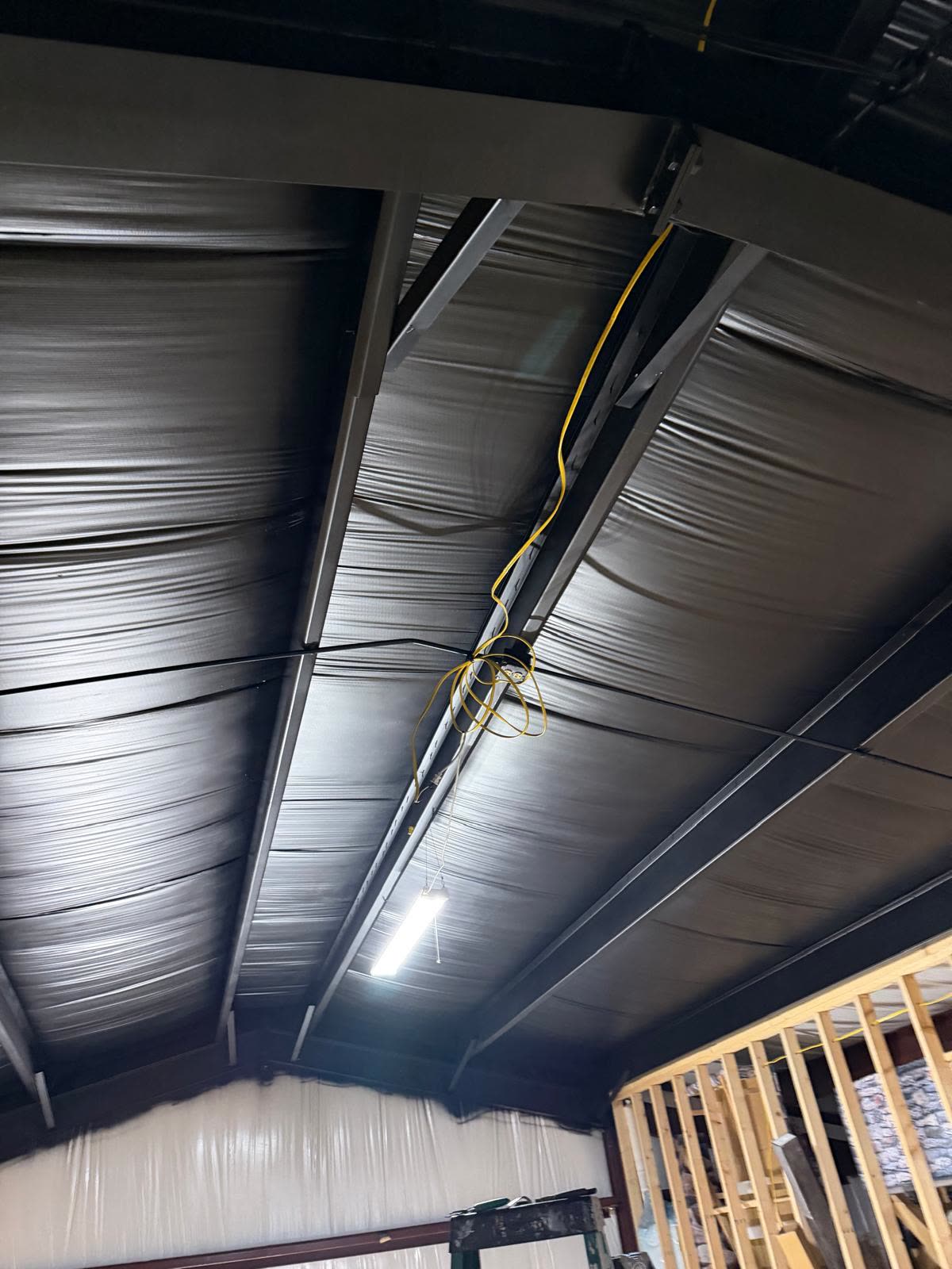 Roof framing structure by Caballero C&L Remodeling showcasing high-quality craftsmanship