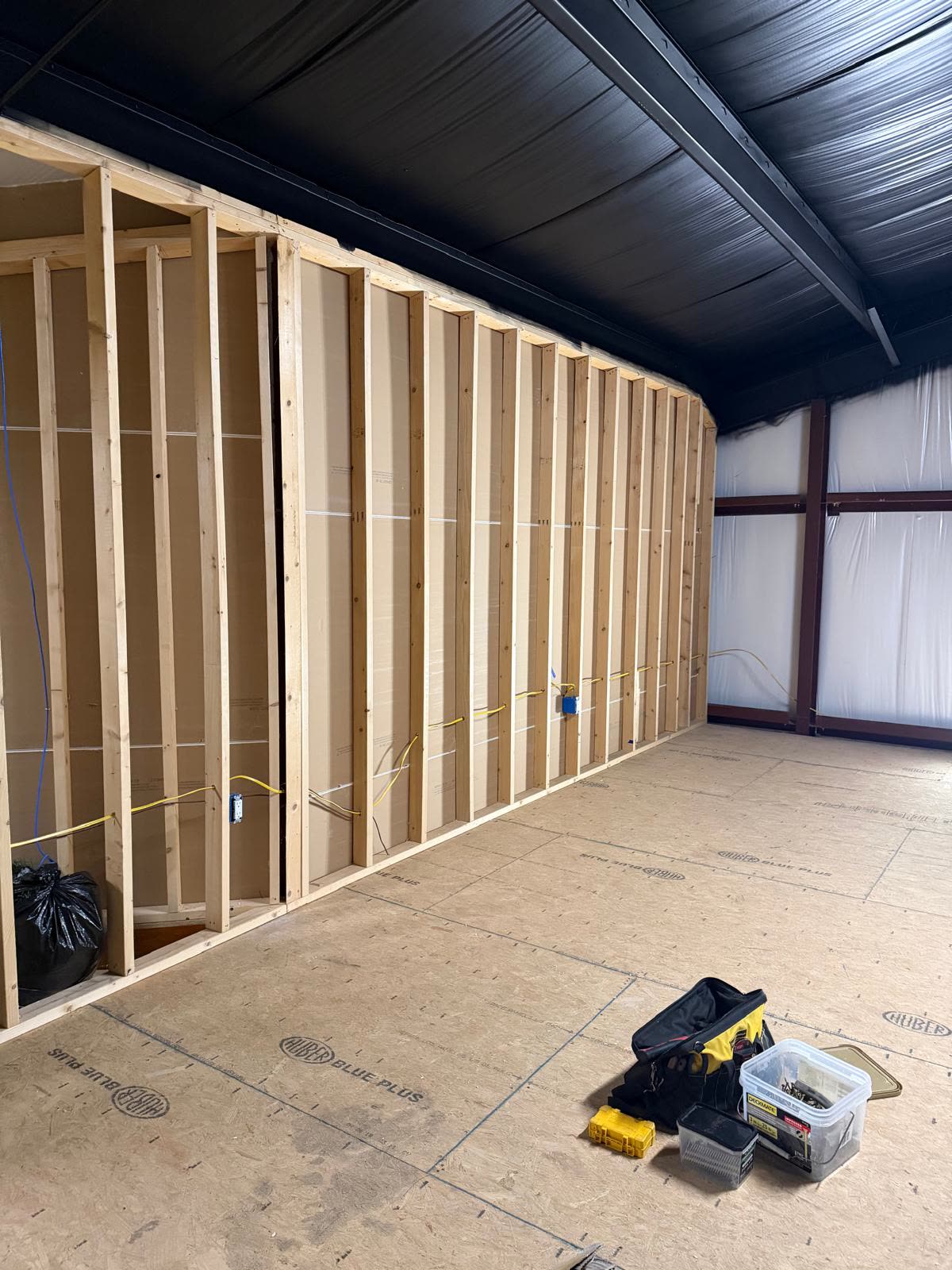Wall framing with electrical conduits